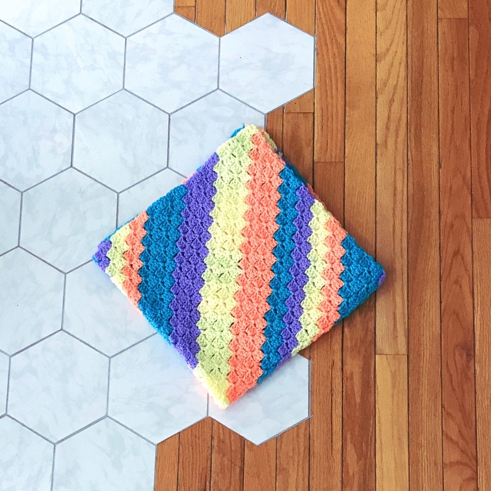 Bright handmade crochet baby blanket